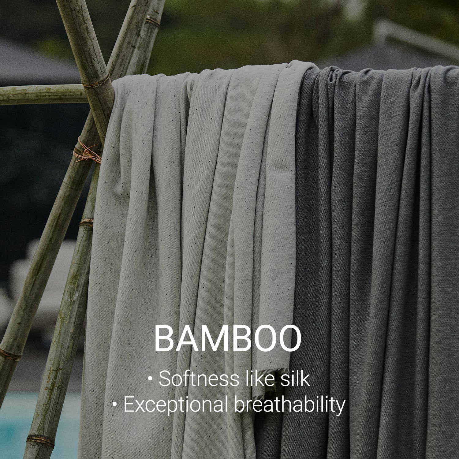 Bamboo fabric draped on a clothesline highlighting silk-like softness and breathability used in Lifement mattress covers