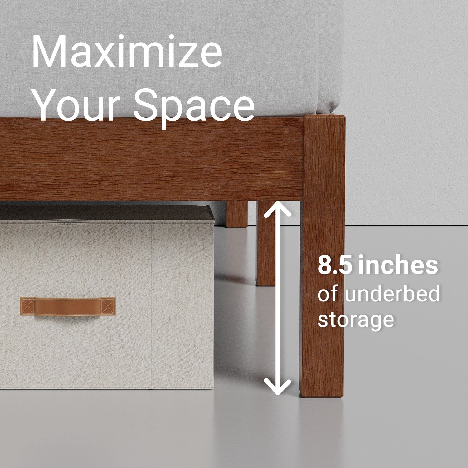 Demonstration of 8.5 inches of vertical storage underneath the cherry colored wooden bed frame 