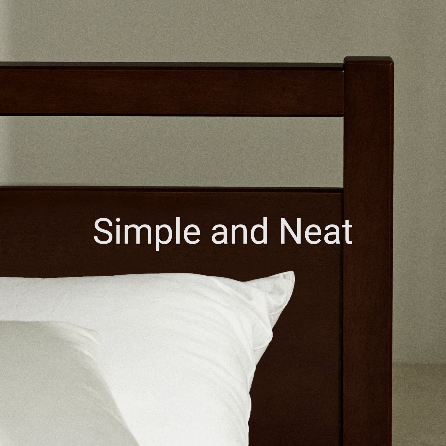 Corner of headboard of walnut colored wood bed frame with text, 'Simple and Neat'