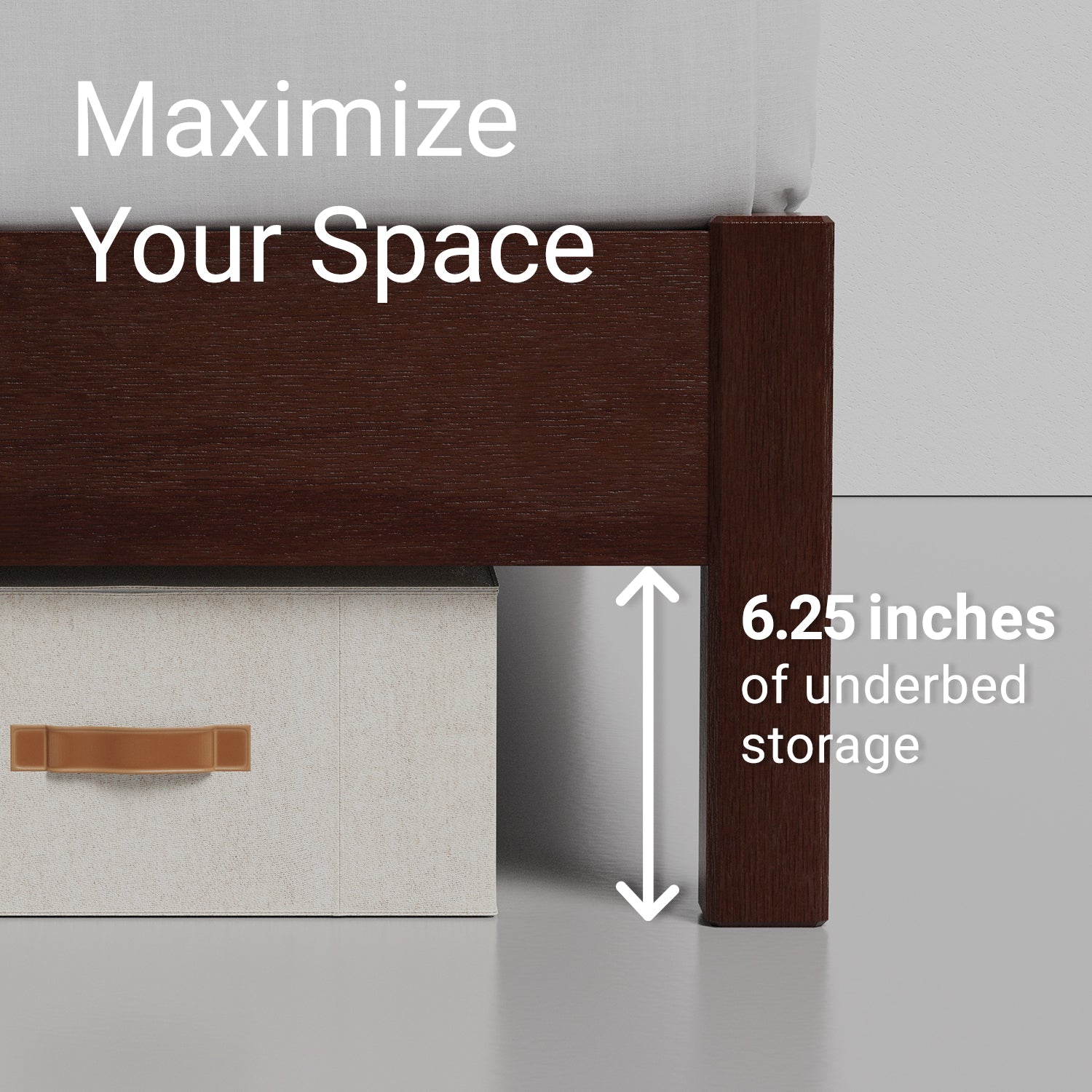 Demonstration of 6.25 inches of vertical storage underneath a walnut colored wood bed frame